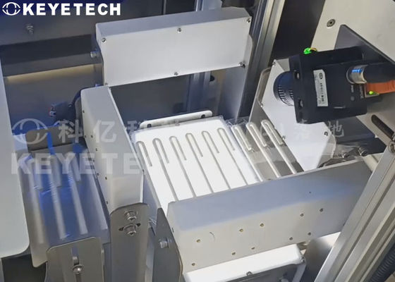 Macchina per l'ispezione visiva di cannucce per bevande con confezione a rotolo e dispositivo di etichettatura