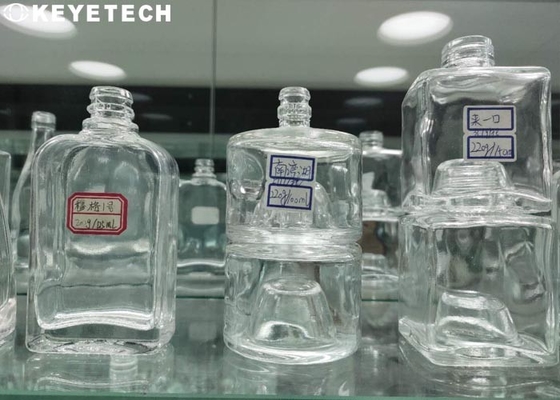 Macchine per l'ispezione visiva con telecamera per prodotti in polvere liquida in contenitori di vetro